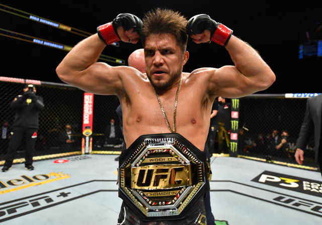 Henry Cejudo with UFC Championship belt