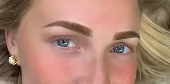 Ombré powder brows results for blonde client with soft natural definition at Body and Brows by Ana in Yardley PA