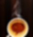 A cup of artisan coffee with latte art in the shape of a question mark, symbolizing meaningful conversations and deep connections—curated by Monica Edwards.