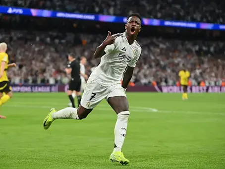 Vinícius Jr. celebrating after scoring for Real Madrid against Borussia Dortmund at the Santiago Bernabéu