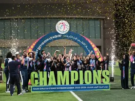 eddah United players celebrate after winning the Saudi Girls U-17 First Division League title at King Abdulaziz University Stadium