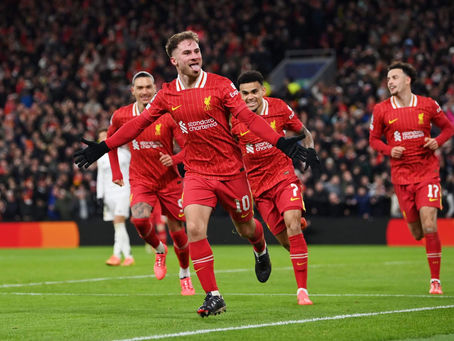 Liverpool players celebrating Alexis Mac Allister’s goal against Real Madrid at Anfield in the Champions League