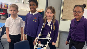 4 children showing their models