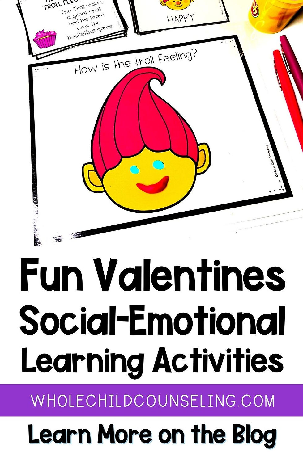 Troll with pink hair and yellow face on worksheet. Text: Fun Valentines Social-Emotional Learning Activities. Colorful pens and paper.