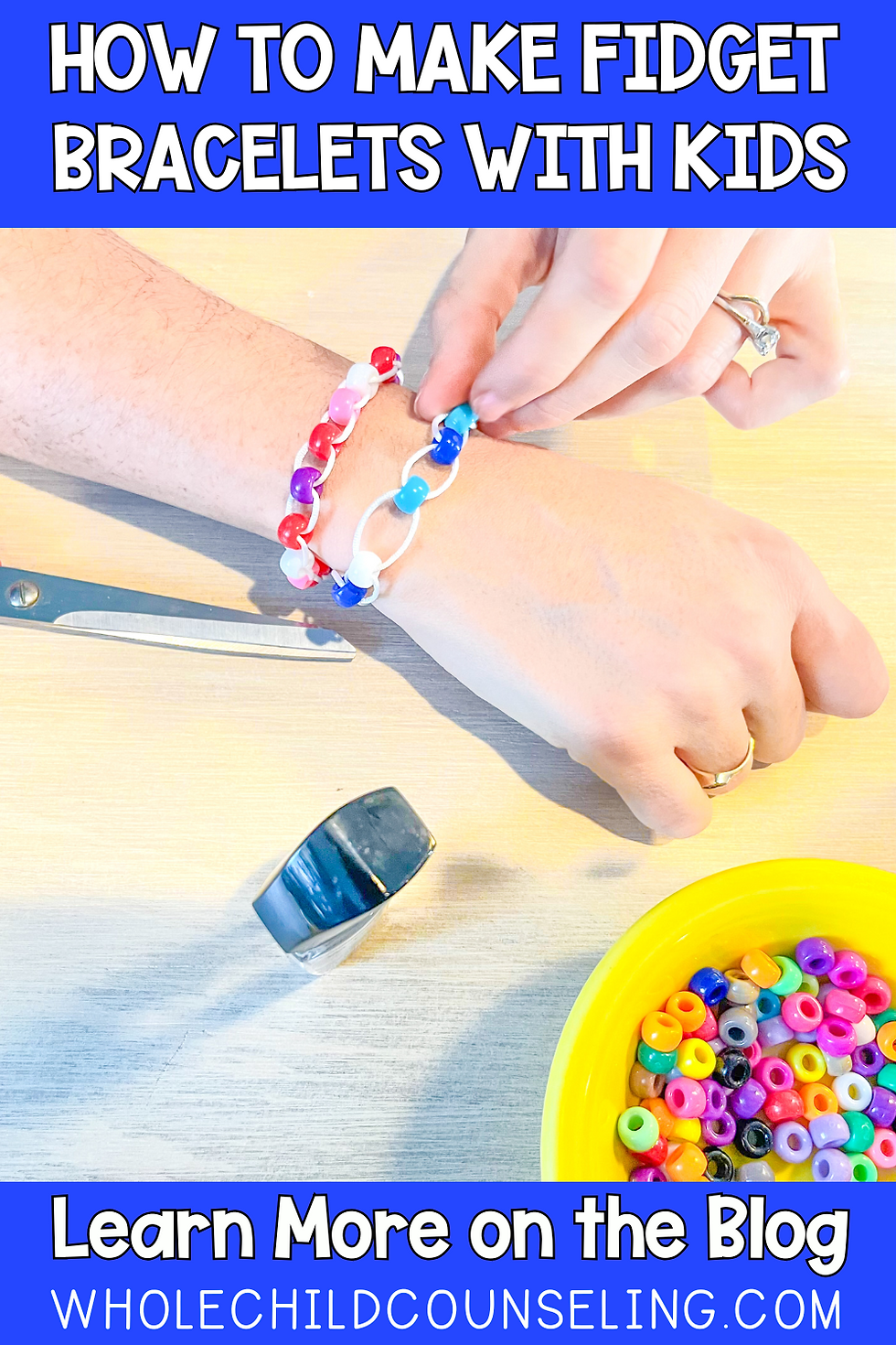 Hands make fidget bracelets with colorful beads on a table. Text: "How to make fidget bracelets with kids. Learn more on the blog."