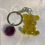 Thumbnail: Small bear  resin keyring with coloured  tassel
