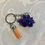 Thumbnail: Stegosaurus resin keyring with coloured  tassel