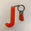 Thumbnail: Letter J resin keyring with coloured tassel (large)