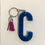 Thumbnail: Letter C resin keyring with coloured tassel (large)