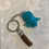 Thumbnail: Tyrannosaurus Rex resin  keyring with coloured  tassel