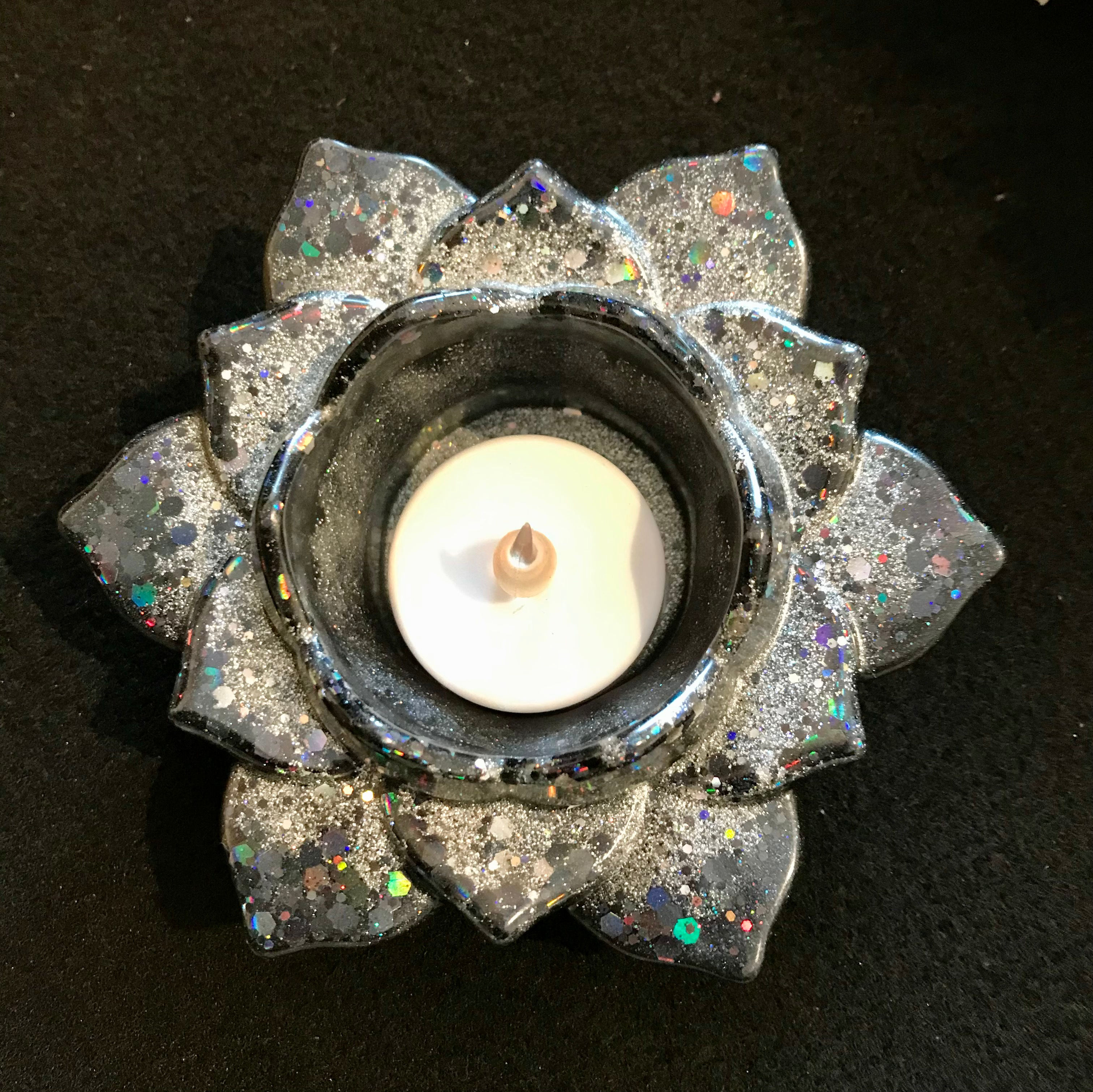 Black and silver lotus flower candle holder with LED candle