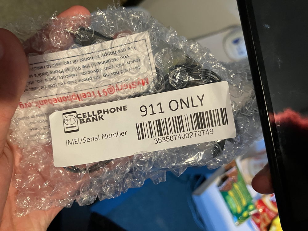 A cellphone from the 911 Cell Phone Bank being donated to Tubman to assist a victim in need
