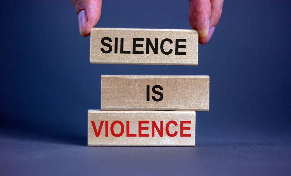 Blocks that say "Silence is Violence"