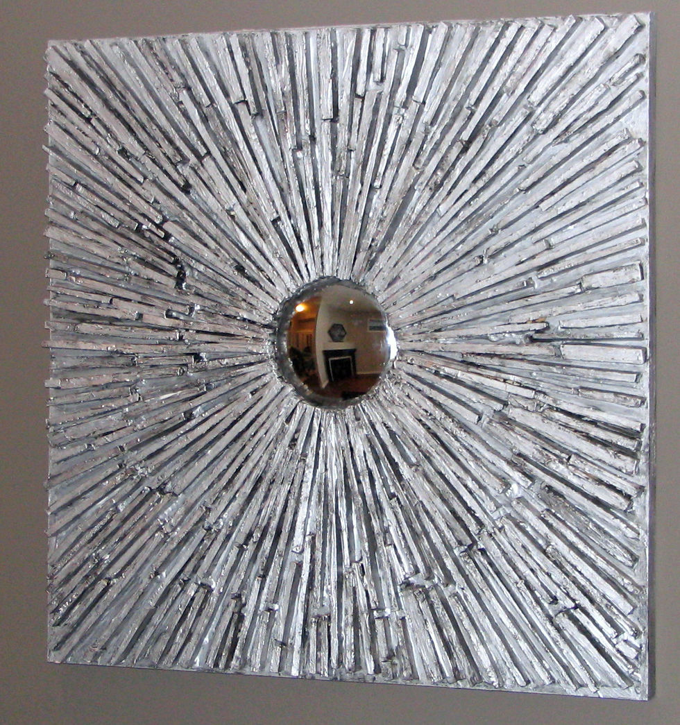 Silver starburst with round mirror