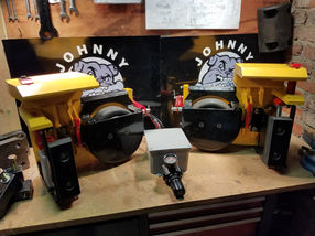 Close up of a set of Johnny Jaws on a work bench in hauler garage