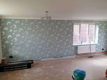 Another wallpapering job on a feature wall in Ammanford