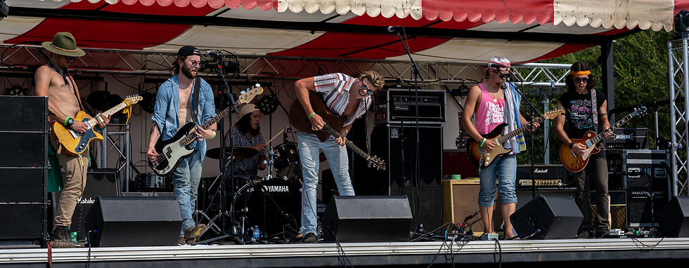 Brayden King with Dead Levee on stage at Jeepfest