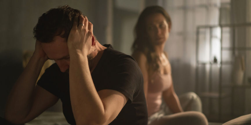 man blocking out the manipulation of ex-girlfriend