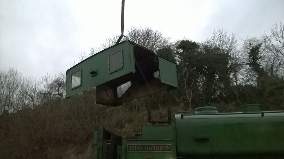 Cab roof being removed