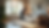 High angle view of a professional cleaner vacuuming a spacious living room