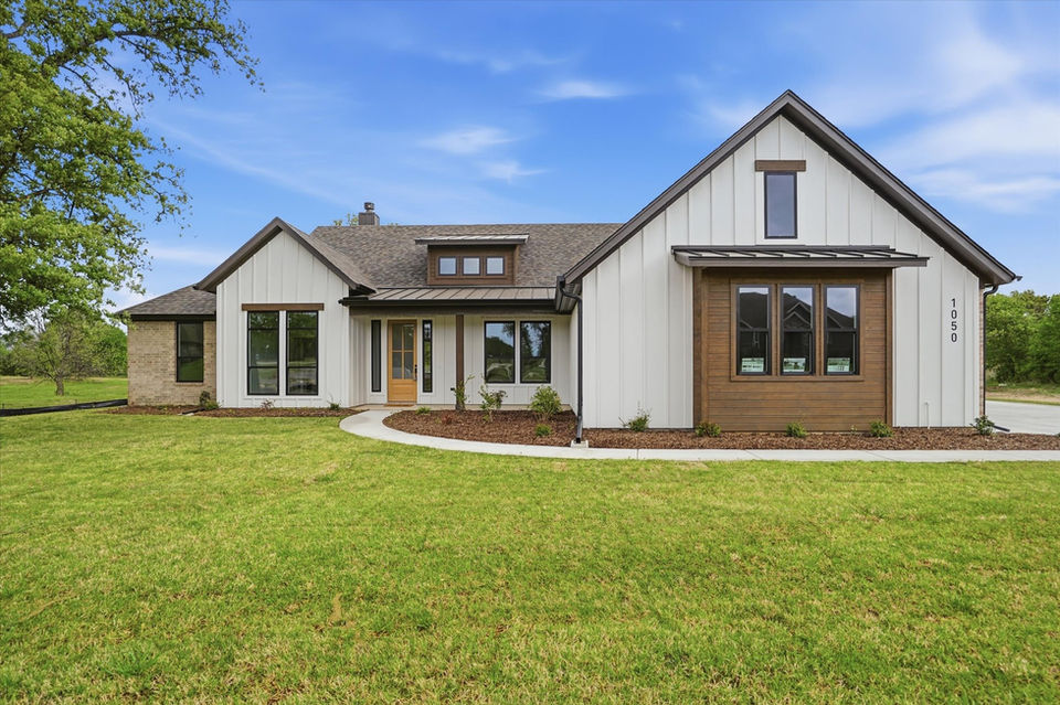 Modern farmhouse home exterior in Weatherford, TX by McBee Homes