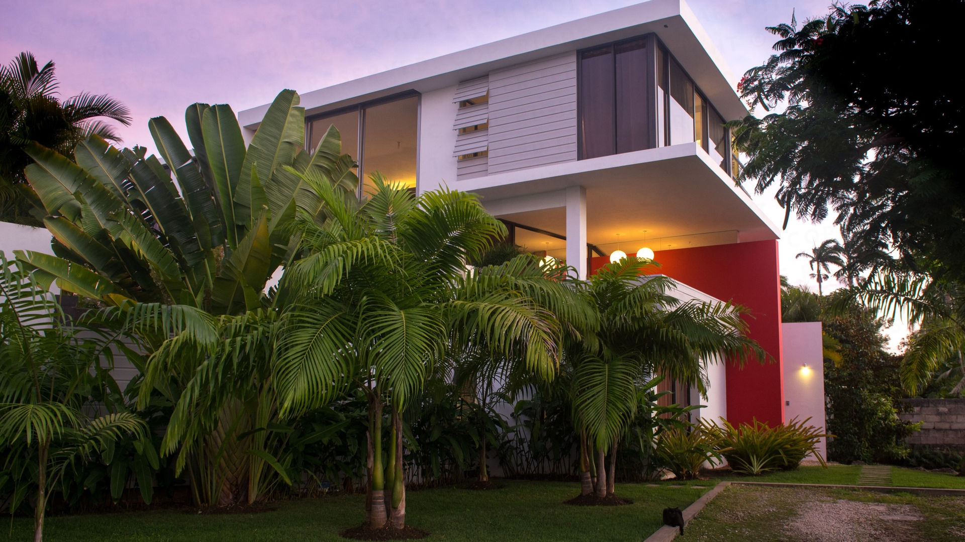 Mindseye
Barbados
One of a series of three villas in this development located on a ridge over looking the west coast of Barbados. This contemporary home harmonise traditional Caribbean elements with strong modern lines.
Blurring and blending, the architecture utilises floor to ceiling, wall to wall glass doors, wall to wall windows and a disappearing roll shutter to bring the outside in and the inside out.
Environmentally responsible, the single bay, open plan design facilitates cross ventilation and ensures that the house remains cool.