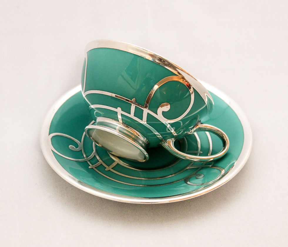 Rosenthal silver overlay cup and saucer