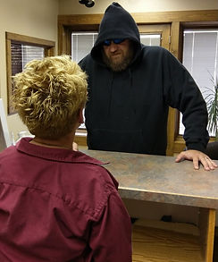 Front Counter Menacing Man