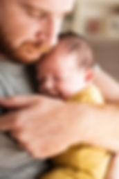 close-up-father-holding-small-baby_edited.jpg