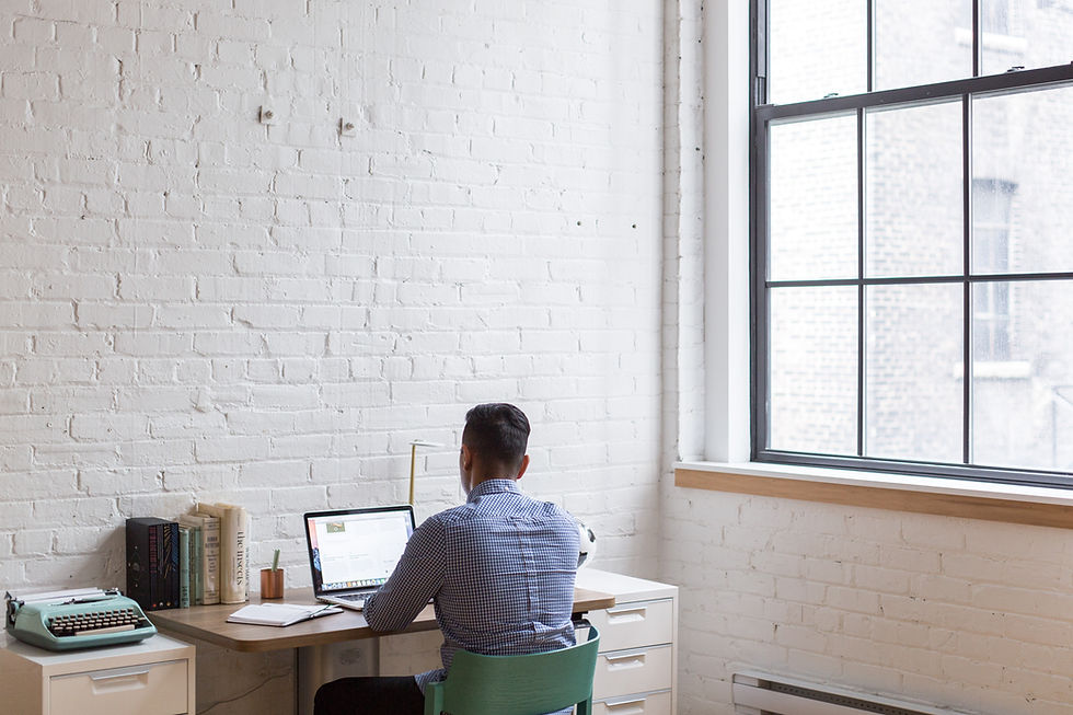 Man working at nearly-empty office