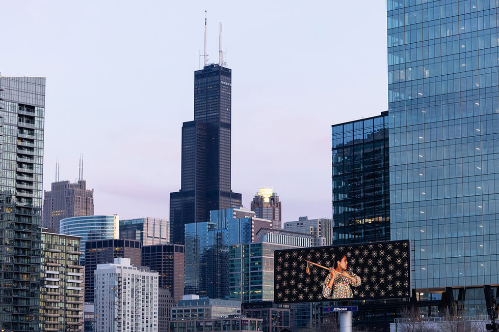 Bella Falcon on billboard in Chicago during Art Expo 2024