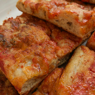 A plate of homemade pizza as an appetizer