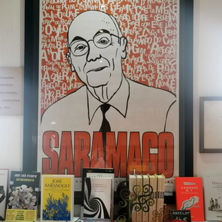 A famous press portrait of the writer and his many books