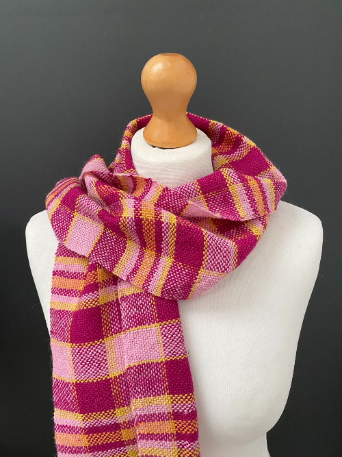handwoven pink, orange and yellow scarf
