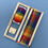 Thumbnail: rectangular bookmark weaving loom kit and a woven bookmark woven with rainbow colours