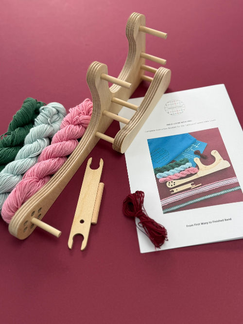 Thumbnail: tabbyandtweed mini portable inkle loom with yarn and instructions