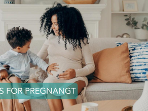 pregnant mom and her elder child on couch