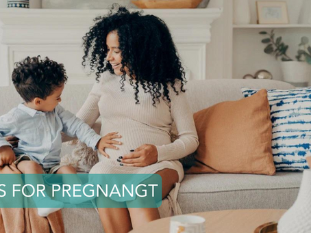 pregnant mom and her elder child on couch