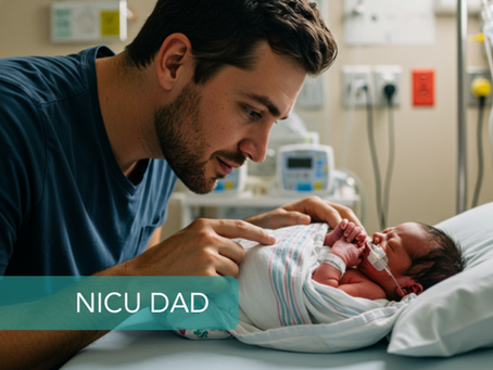 Dad with baby in NICU; father holding premature baby in hospital; NICU bonding moments