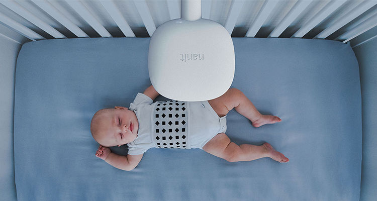 Nanit Pro Smart Baby Monitor baby sleeping in crib