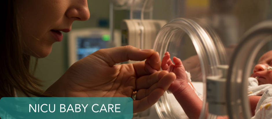 Mother holding premature baby’s hand in NICU