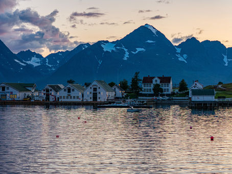 Havnnes under the midnight sun with the lyngen alps in the background