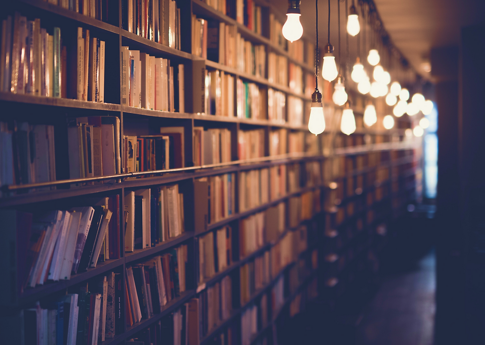 Inside a small library with books sticking out of shelf.