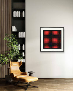 Cuadrados Ópticos en Rojo sobre oscuro