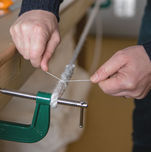 A Wills Marquees craftsperson uses time honoured techniques to make rope by hand