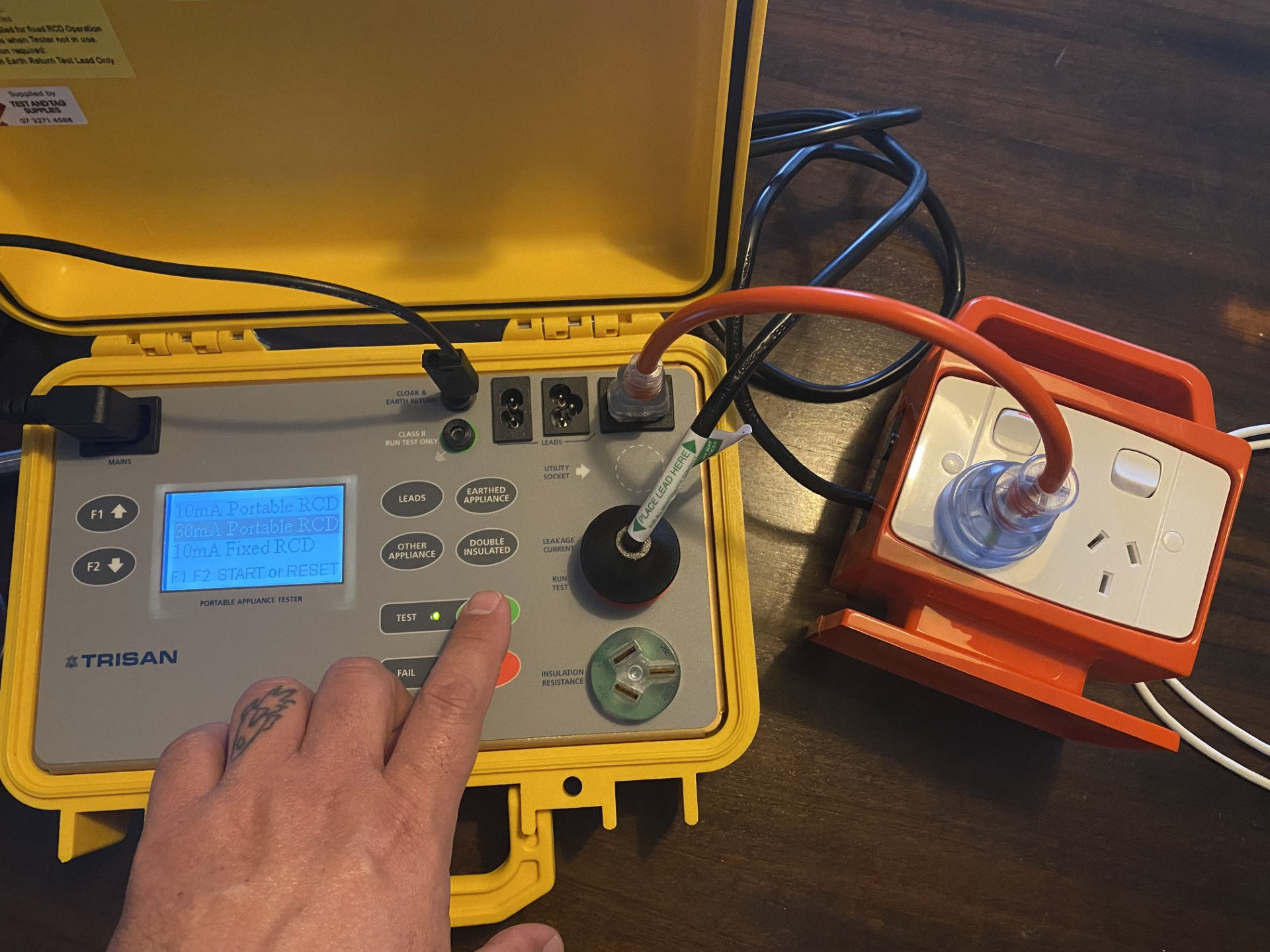 applying tag to equipment which has passed safety testing