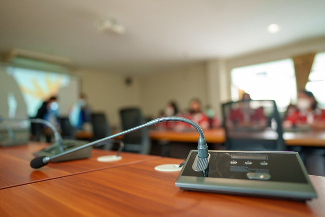 close-up-microphone-conference-meeting-room-background.jpg