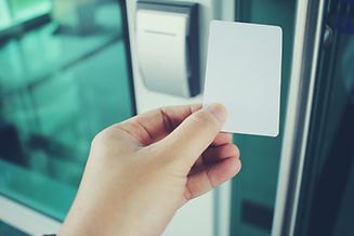 hand-using-security-key-card-scanning-open-door.jpg