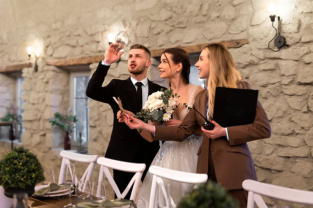 female-wedding-planner-working-with-bride-groom.jpg