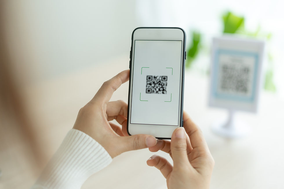Modern woman use phone to scan barcode or QR codes to pay credit card bill after receive d